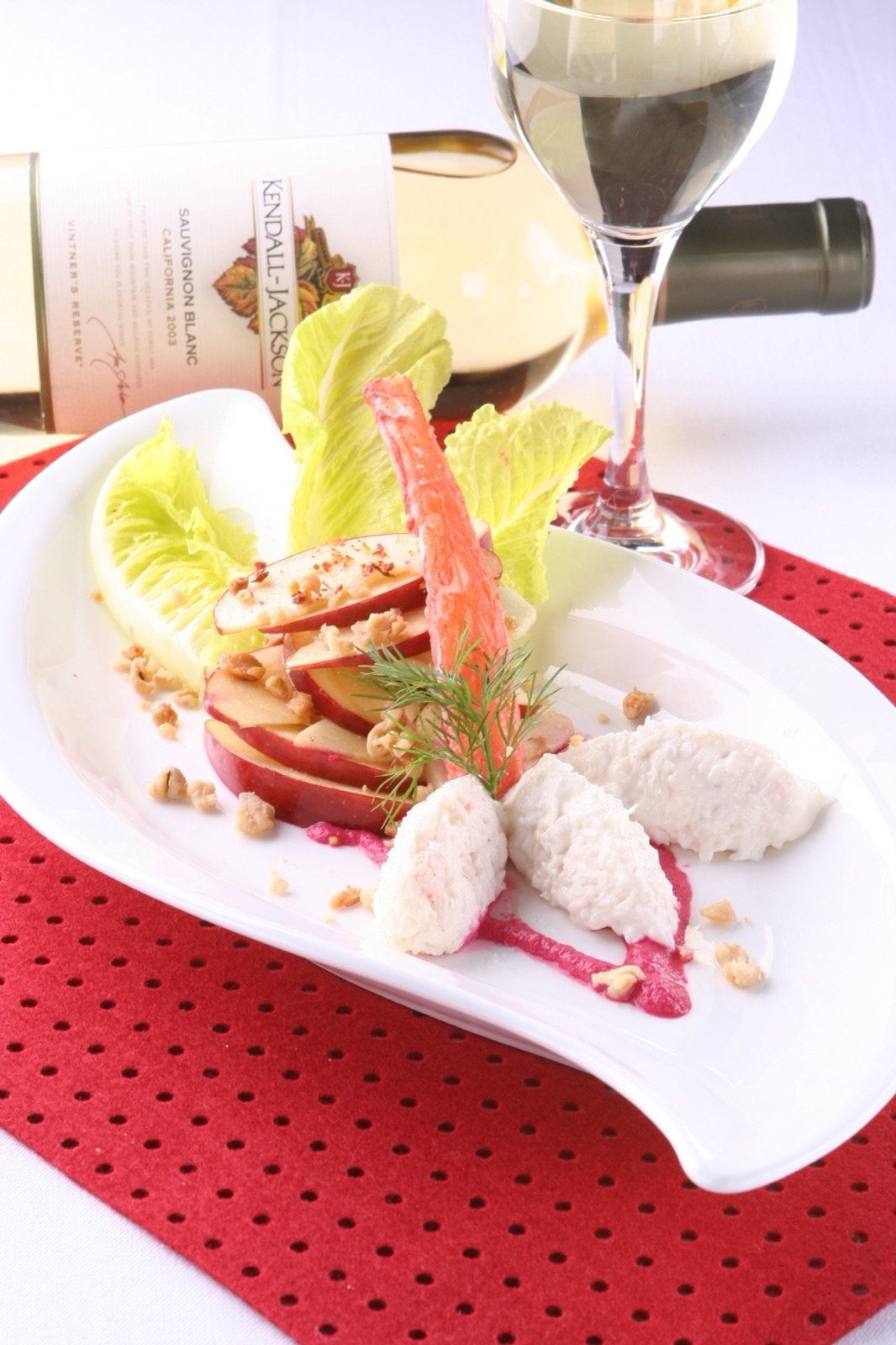 Apple and crab salad with walnut crumb, beetroot dressing and Sauvignon Blanc